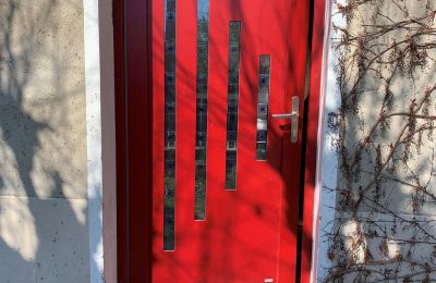 Porte d'entrée rouge en pvc